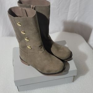 Children place studded boots